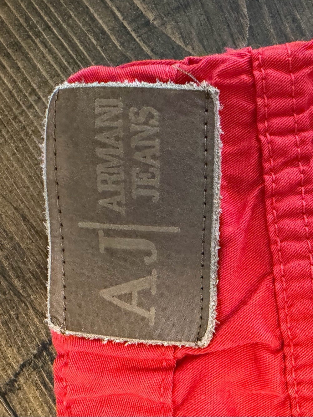 Bright Red Jeans with Leather Patch and Metal Logo